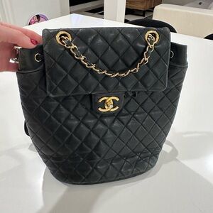 Chanel Black Quilted Backpack with Gold Accents